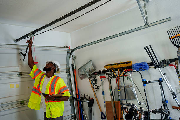 Professional Garage Door technician working in Atkinson, IL